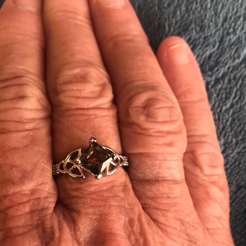 New silver ring with topaz colored stone